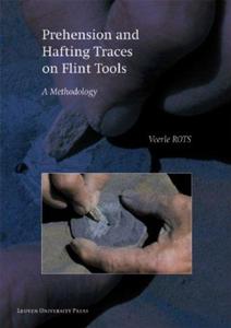 Prehension and hafting traces on flint tools : a methodology