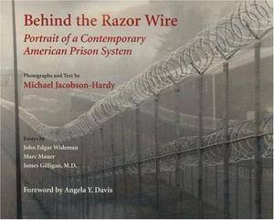 Behind the razor wire